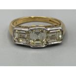 Stunning 18ct gold 3 stone Emerald cut diamond ring. Comprising of 3 emerald cut diamonds approx