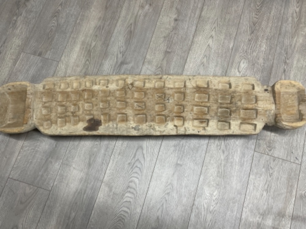 Antique wooden East African very large 49” Mancala board and associated pebbles