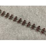 Silver and 42 garnet set link bracelet 25.8g