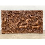 Heavy carved Asian wooden wall plaque
