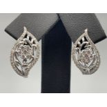 18ct white gold diamond set flower pattern earrings 1.5cts