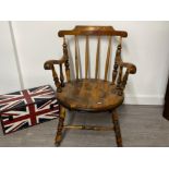 Victorian captain style chair on turned legs armrests and stretchers in oak