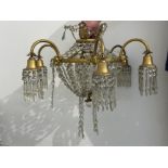 Vintage French empire style chandelier gold colour metal fittings and cut glass reflective pear