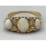 18ct gold opal and diamond ring. Size Q 4.36g