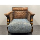 Oak leather Antique Library chair with leather arms and rear, tooled. Berger sides to arms intact