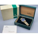 Rolex gents 14ct gold oyster perpetual watch with blue dial set with baton hour markers. Self wind