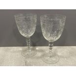 Pair handmade and extensively etched 7.5” goblets on applied etched foot and 5 ball graduated stem