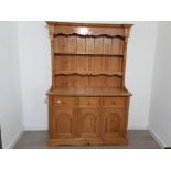 Farm house style pine kitchen dressers . Height 202 cm width 139 cm depth 55cm