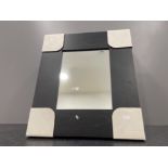 5 black framed mirrors