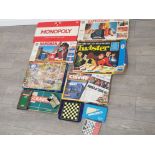 Selection of vintage board games including Monopoly, Scrabble, Cluedo etc