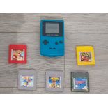 Nintendo game boy color with 5 games including Metroid, Donkey Kong land etc please see imagines for