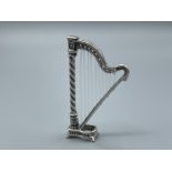 An unusual silver figure of a Harp 14g