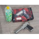 2 airsoft pistol guns plus a large Quantity of BB pellets