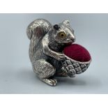 Silver squirrel pincushion