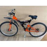 A Barracuda mountain bike with sprung frame, Shimano gears and brakes velo soft seat etc