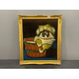 Gilt framed painting on velvet of dog in bucket 49cm x 60cms