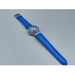 Steel cased wristwatch on blue leather strap