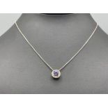 9ct gold tanzanite and diamond pendant with chain