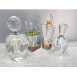 4 glass perfume bottles with stoppers