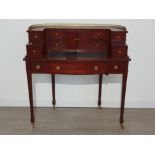 Reproduction mahogany bureau desk in regency style with brass effect trim and handles 104x42cm