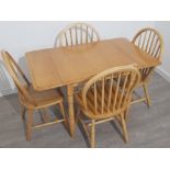 Malaysian rubberwood drop leaf kitchen table and 4 matching Windsor back chairs, 120x76cm