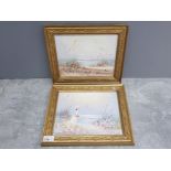 Pair of gilt framed oils on canvas paintings of beach scenes 33cm x 28cm