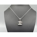 Silver and CZ channel style pendant and chain 7.1g