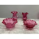 4 pieces of cranberry glass