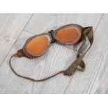 Pair of Early flying goggles, possibly military with amber tinted glass, a good example