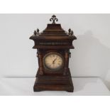 Reproduction late Victorian mantle clock with side carry handles