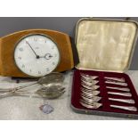 Box of cake forks, sterling silver nurses badge, salad servers and 1950/60s clock