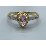 Ladies 9ct gold pink pear stone and diamond ring 1.22g size O