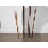 Four vintage hand made cane fishing rods.one signed and dated 1967