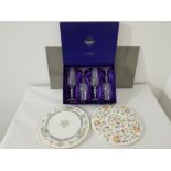 A Edinburgh crystal champagne flutes boxed together with a Minton and a Royal Worcester cake plate