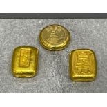 Three antique Chinese yellow metal ingots/money