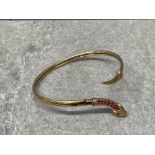 9ct gold snake bangle with 7 pink stones 7.83g