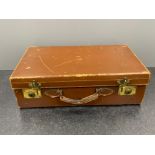 Vintage brown leather suitcase