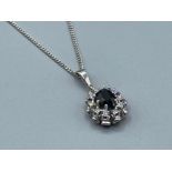 14ct white gold sapphire diamond cluster pendant on the white gold chain approx .25ct diamond