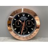 Rose gold colour wall clock in the style of Rolex Daytona