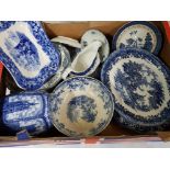 Box of mixed blue and white dinnerware including ringtons, old willow pattern plates etc