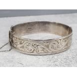 Hallmarked silver cuff bracelet with half etched design and safety chain 46g