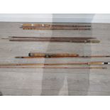 Four handmade vintage cane fishing rods signed and dated