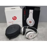 Monster beats by Dr Dre studio powered on ear phones, in white, working condition in original box