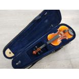 A good quality well loved violin in carry case
