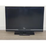 A 32 inch sony television with remote