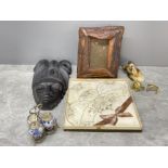 Miscellaneous items including wall face mask, carved wooden photo frame and cruet set