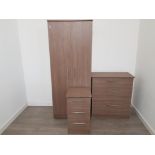 Lovely modern bedroom suite to include wardrobe chest of drawers and bedside cabinet.
