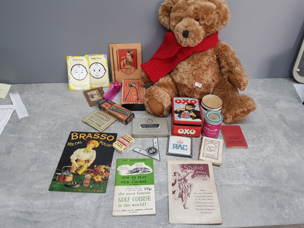 Box of assorted old memorabilia including vintage hair clippers, Honky Tonk harmonica and Teddy bear