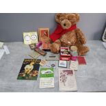 Box of assorted old memorabilia including vintage hair clippers, Honky Tonk harmonica and Teddy bear