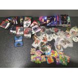 Mixed collectors lot containing a large Quantity of star wars Tazos, walkers Warner Bros jigsaw